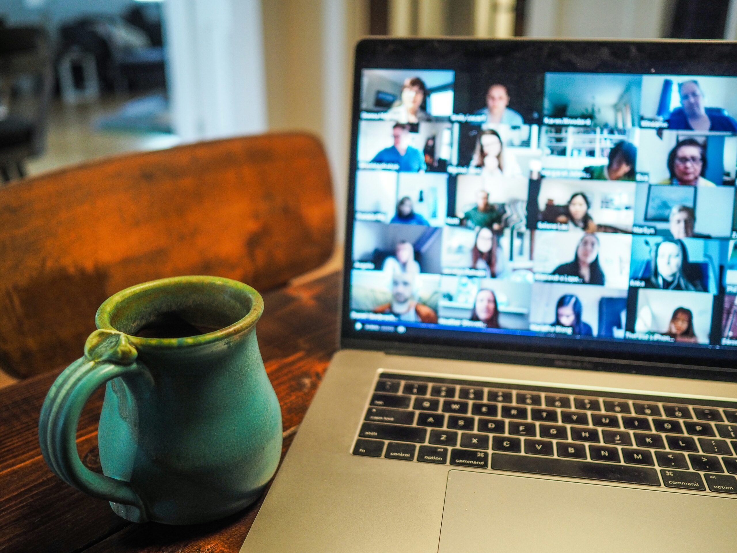 Laptop screen showing business data, representing the online strategy work of the Academy of Conscious Entrepreneurship